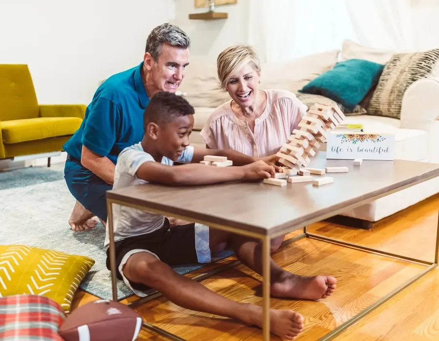 A family playing a board game together at home