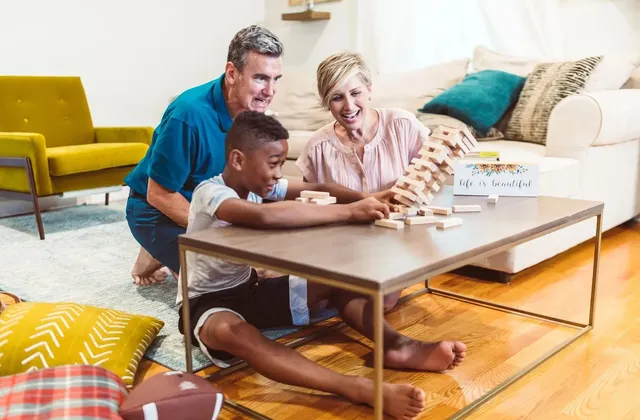 A family playing a board game together at home